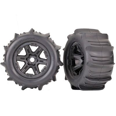 Pneus pelle coll�s sur jantes noires pour Traxxas Sledge 8674